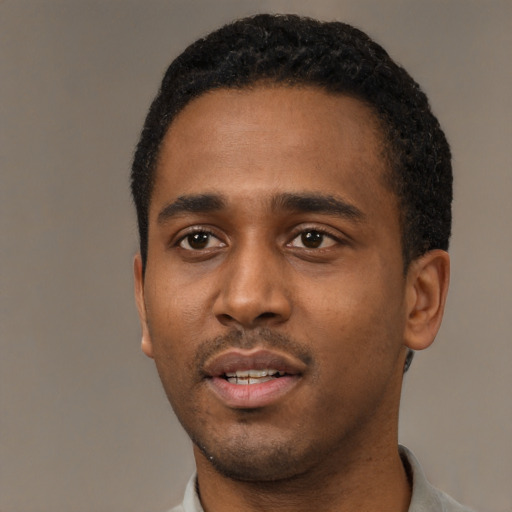 Neutral black young-adult male with short  black hair and brown eyes
