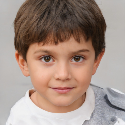 Joyful white child male with short  brown hair and brown eyes