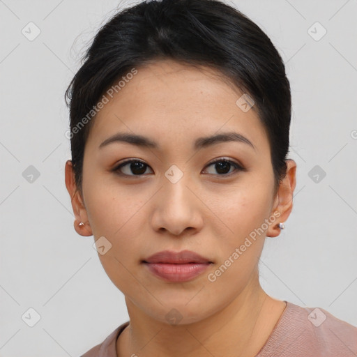 Joyful asian young-adult female with short  brown hair and brown eyes