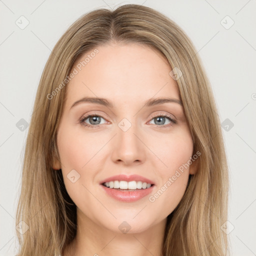 Joyful white young-adult female with long  brown hair and green eyes