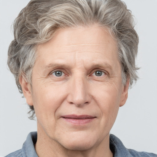 Joyful white middle-aged male with short  brown hair and grey eyes