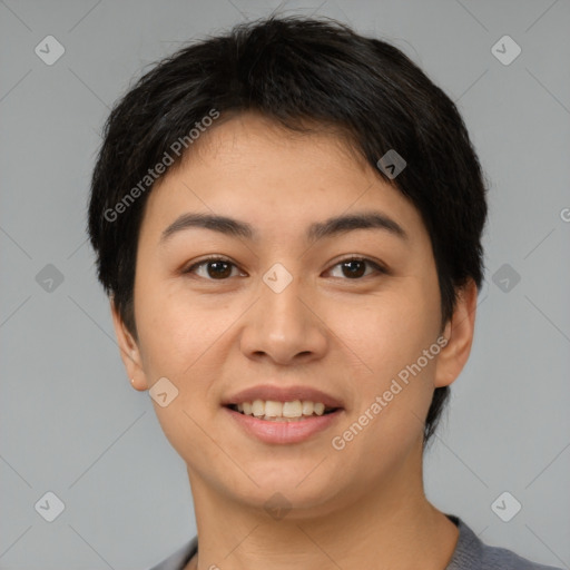 Joyful asian young-adult female with short  brown hair and brown eyes