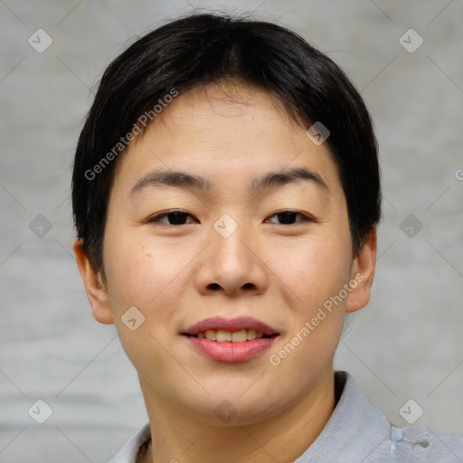 Joyful asian young-adult female with short  brown hair and brown eyes