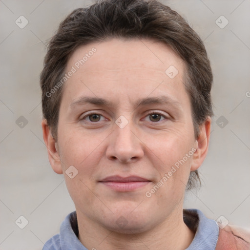 Joyful white adult male with short  brown hair and grey eyes