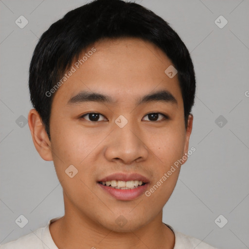 Joyful asian young-adult male with short  black hair and brown eyes