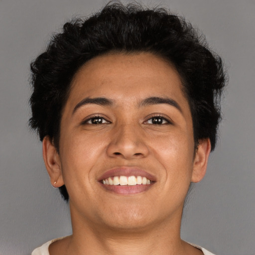 Joyful asian young-adult female with short  brown hair and brown eyes