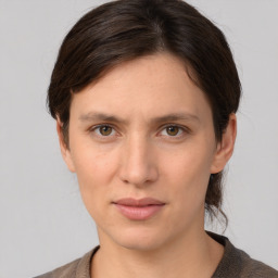 Neutral white young-adult female with short  brown hair and brown eyes