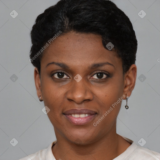 Joyful black young-adult female with short  black hair and brown eyes