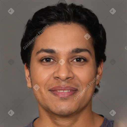 Joyful latino adult male with short  black hair and brown eyes