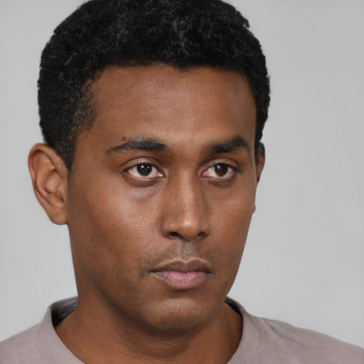 Neutral black young-adult male with short  black hair and brown eyes