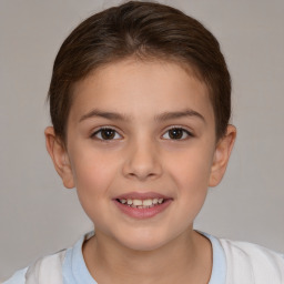 Joyful white child female with short  brown hair and brown eyes