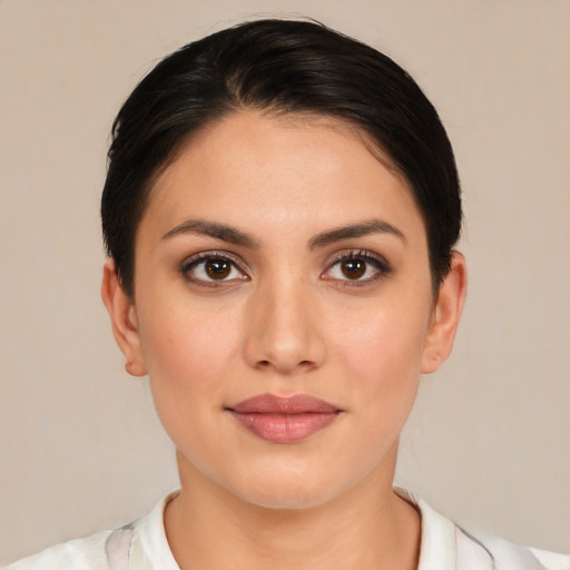 Joyful white young-adult female with medium  brown hair and brown eyes