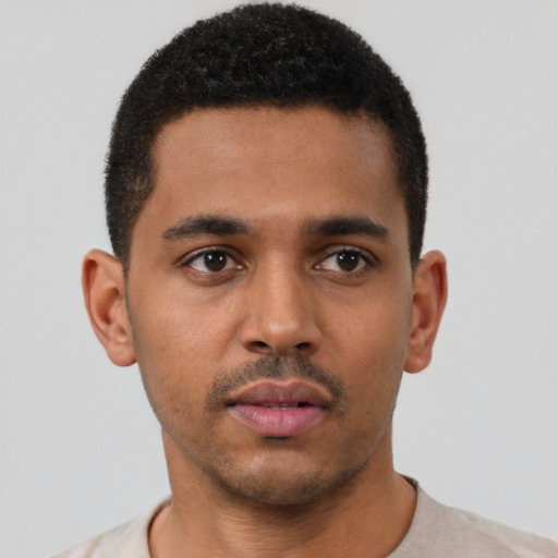 Neutral black young-adult male with short  black hair and brown eyes