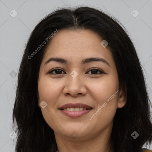 Joyful asian young-adult female with long  brown hair and brown eyes