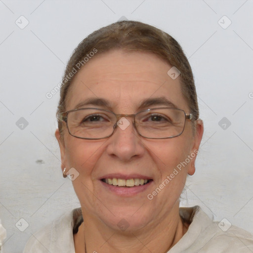 Joyful white adult female with short  brown hair and brown eyes