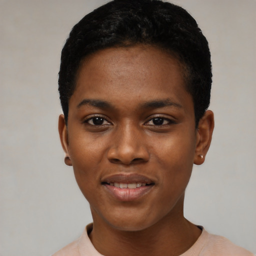 Joyful black young-adult female with short  black hair and brown eyes