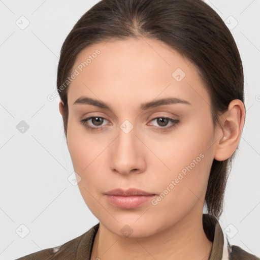 Neutral white young-adult female with medium  brown hair and brown eyes