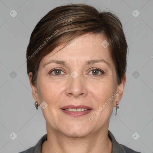 Joyful white adult female with medium  brown hair and grey eyes