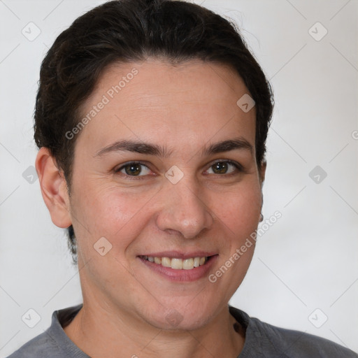 Joyful white adult female with short  brown hair and brown eyes