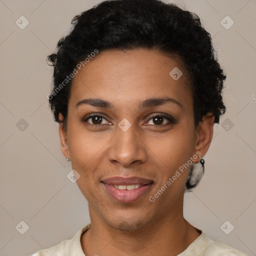 Joyful black young-adult female with short  black hair and brown eyes