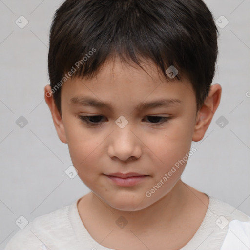 Joyful white child male with short  brown hair and brown eyes