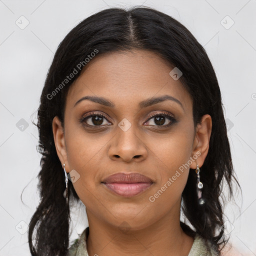 Joyful black young-adult female with long  brown hair and brown eyes