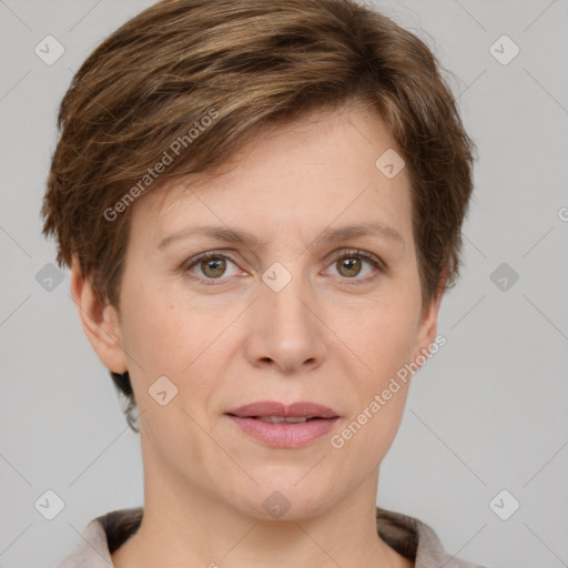 Joyful white adult female with short  brown hair and grey eyes