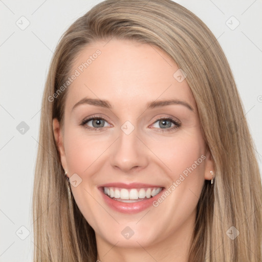 Joyful white young-adult female with long  brown hair and grey eyes