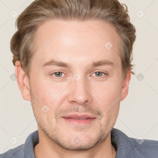 Joyful white adult male with short  brown hair and grey eyes