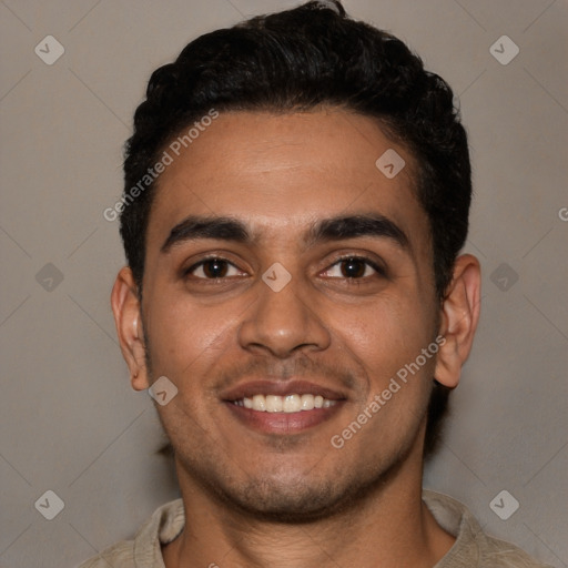 Joyful white young-adult male with short  black hair and brown eyes