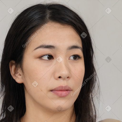 Neutral white young-adult female with long  brown hair and brown eyes