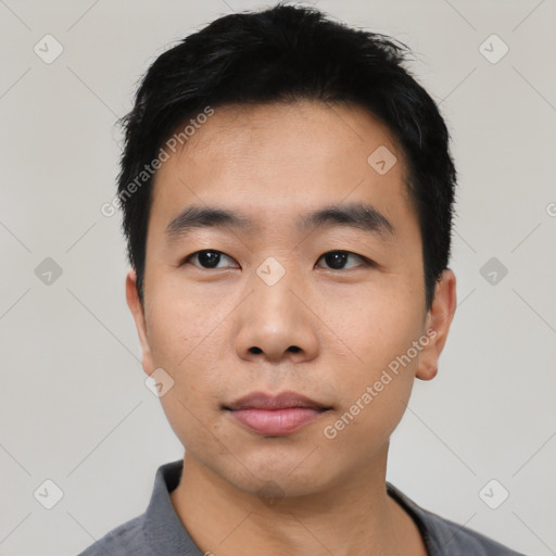 Neutral asian young-adult male with short  black hair and brown eyes