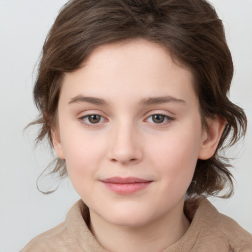 Joyful white child female with medium  brown hair and brown eyes