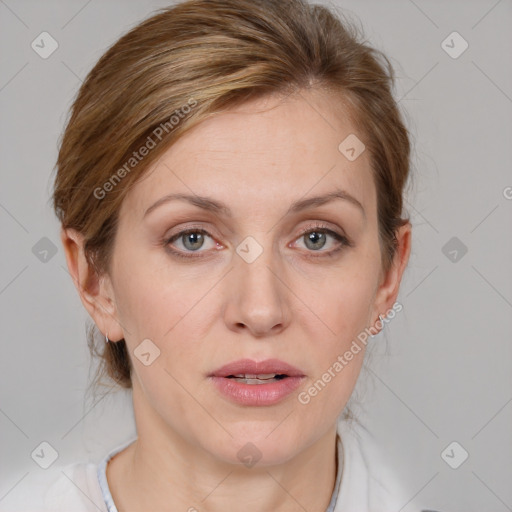 Joyful white adult female with medium  brown hair and blue eyes