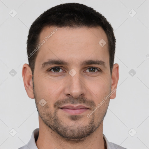 Joyful white young-adult male with short  brown hair and brown eyes