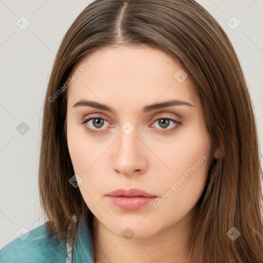 Neutral white young-adult female with long  brown hair and brown eyes