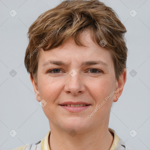 Joyful white young-adult female with short  brown hair and grey eyes