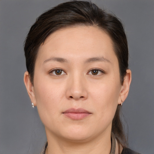 Neutral white young-adult female with medium  brown hair and brown eyes