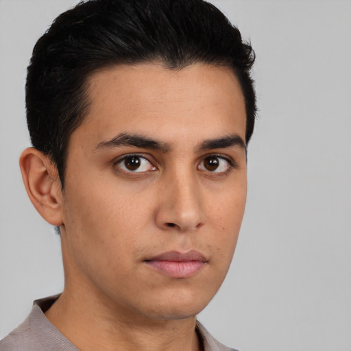 Neutral latino young-adult male with short  black hair and brown eyes