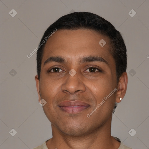 Joyful black young-adult male with short  brown hair and brown eyes