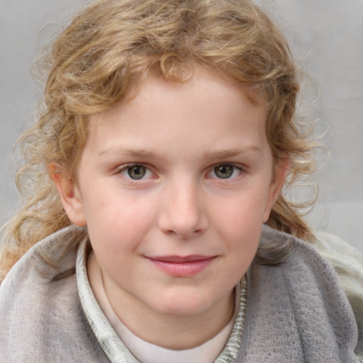 Joyful white child female with medium  brown hair and blue eyes