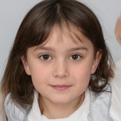 Neutral white child female with medium  brown hair and brown eyes