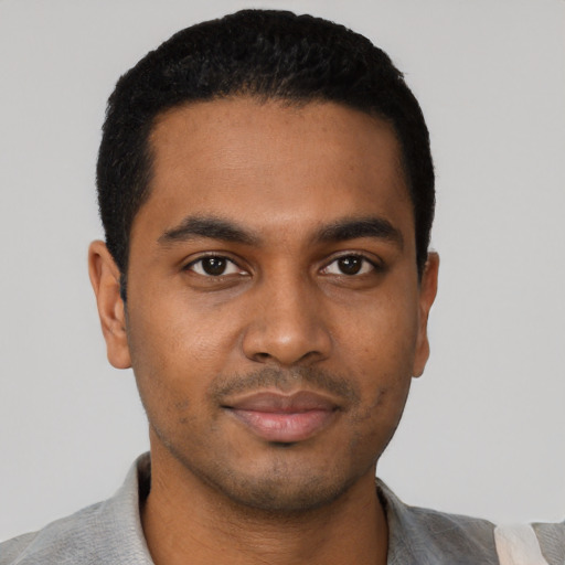Neutral black young-adult male with short  black hair and brown eyes