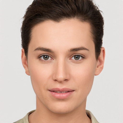 Neutral white young-adult female with short  brown hair and brown eyes