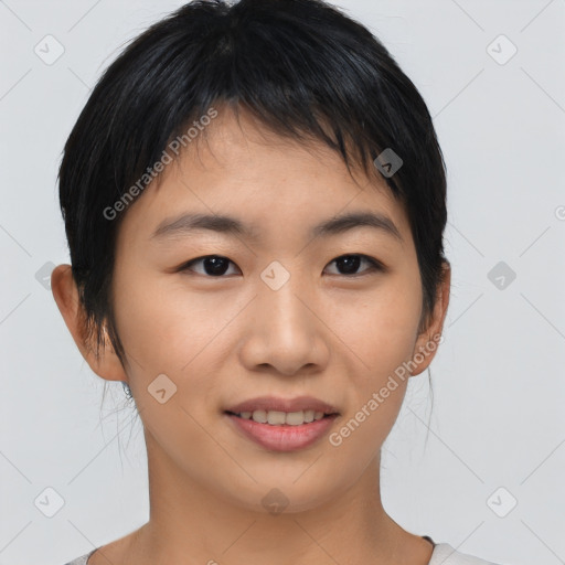 Joyful asian young-adult female with short  brown hair and brown eyes