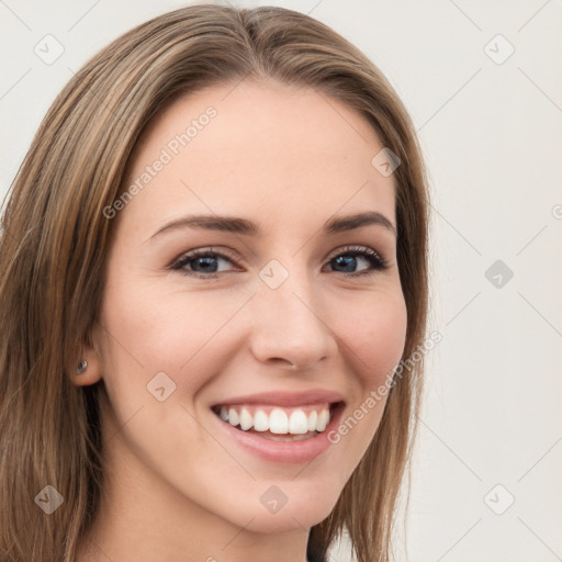 Joyful white young-adult female with long  brown hair and grey eyes