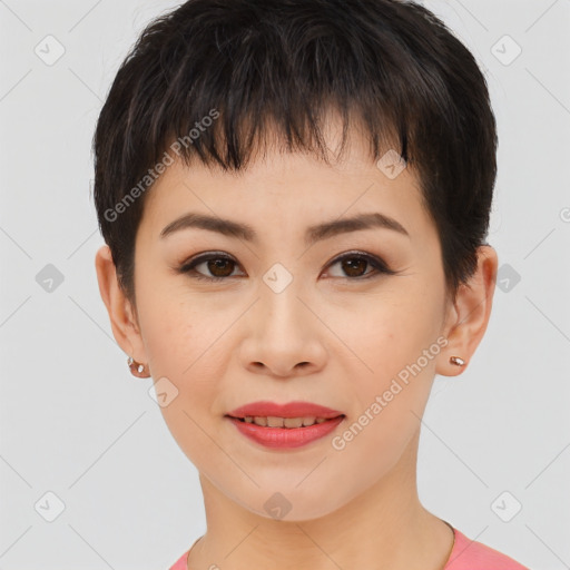 Joyful asian young-adult female with short  brown hair and brown eyes