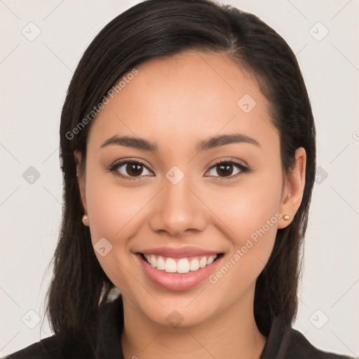 Joyful white young-adult female with long  brown hair and brown eyes