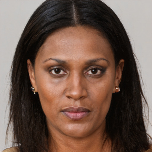 Neutral white adult female with long  brown hair and brown eyes