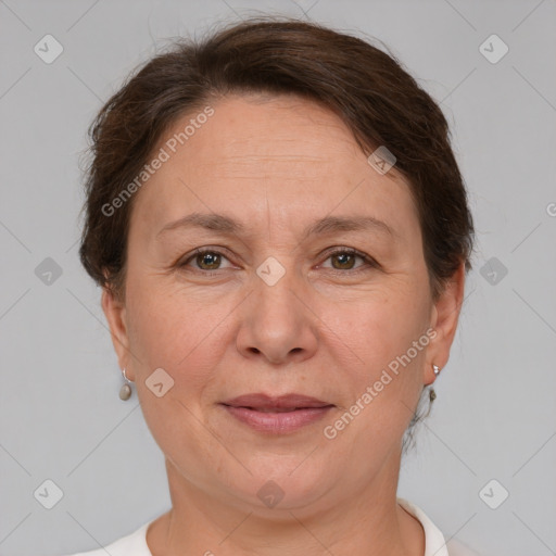 Joyful white adult female with short  brown hair and brown eyes